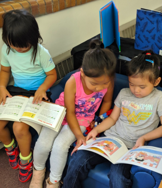 Kids reading together